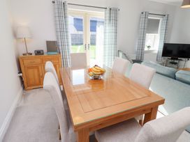 A dining room with a table and chairs at The Haven Embleton