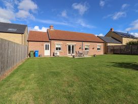 A house with a patio and garden at The Haven in Embleton