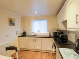 A kitchen with cabinets and appliances at La Rochelle in Whitby