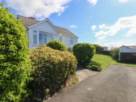 A house with bushes and garden at Highdown Bigbury on Sea near Modbury