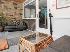 A snug area with a sofa and coffee table at Seacrest Lodge in Scarborough
