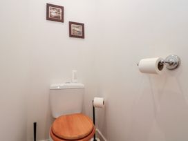 A toilet with toilet paper in a bathroom at Seacrest Lodge in Scarborough