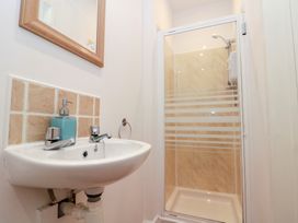 A bathroom with a sink and shower at Seacrest Lodge in Scarborough