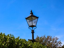 A lamp post with the numbers 122 and 155 at Seacrest Lodge in Scarborough