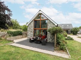 A house with outdoor seating area at Budmouth Upwey near Weymouth