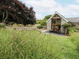A house with a patio and chairs at Budmouth in Upwey near Weymouth