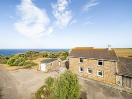 A house with a garage and view of the sea at Tregiffian Vean Sennen Cove