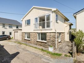 A house with a garage and car at Brook House Sennen Cove near St Just