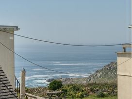 View of the ocean and cliffs from a property at Brook House Sennen Cove near St Just