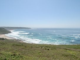 A beach view with ocean waves at Brook House Sennen Cove near St Just