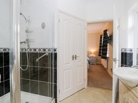 A bathroom with a shower and sink at Kempton in Bowness-on-Windermere