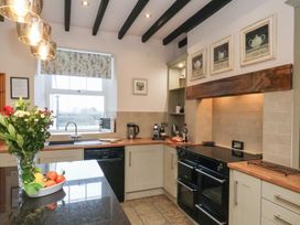 A kitchen with countertop and appliances at The Farmhouse in Boggle Hole near Robin Hood's Bay