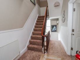A staircase leading to a hallway at The View Criccieth
