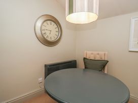 A dining room with a table and chair at Gable End in Coniston near Hawkshead