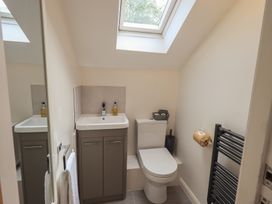 A bathroom with a sink and toilet at Yew - Woodland Cottages Bowness-On-Windermere