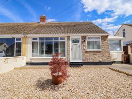 A house exterior with a door and windows at Chy Bean Abergele