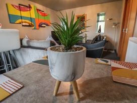 A plant on a table in a living room at Fortunatus in Whitby