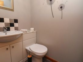 A bathroom with a sink and toilet at Fortunatus in Whitby