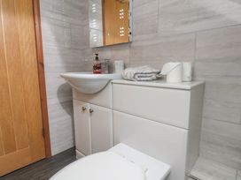 A bathroom with a sink and toilet at Fortunatus in Whitby
