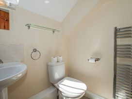 A bathroom with a sink and toilet at The Wainhouse in Bockleton near Tenbury Wells
