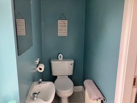 A bathroom with a sink and toilet at Silver Birch House Beaufort Killarney, County Kerry