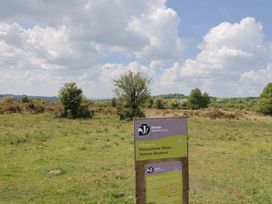A nature reserve sign at Knowstone Moor Nature Reserve in Knowstone