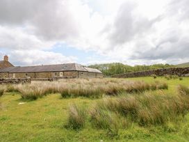 A stone building with grassland at Gallow Law Cottage Bellingham