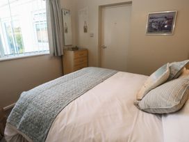 A bedroom with a bed and drawer unit at Bre An Mor in Praa Sands