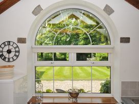 A window with a view of the garden at Trevenning Chapel Near Port Isaac