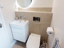 A bathroom with a sink and toilet at Lanesend in St Agnes