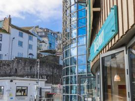A view of buildings and a sign at Blue Horizon in Brixham