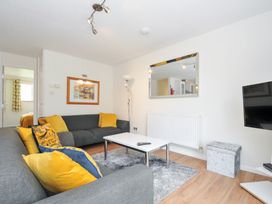 A living room with a coffee table and sofa at Manorcombe 2 in Callington