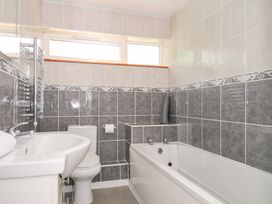 A bathroom with sink, toilet, and bathtub at Manorcombe 2, Callington