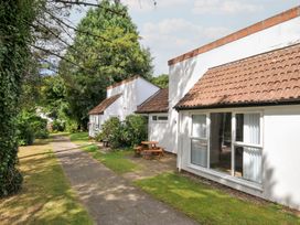 Two cottages with pathway and seating at Manorcombe 2 Callington