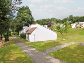 Outdoor view of houses and pathway at Manorcombe 2 in Callington