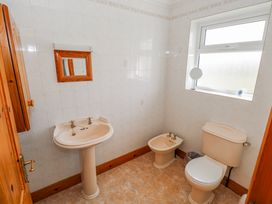 A bathroom with a sink, toilet, and bidet at Castle View, Oughterard, County Galway
