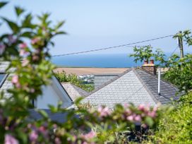 A view of rooftops and the sea at Easterly Cottage in Bude