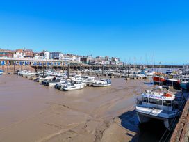A marina with boats at a dock at Apt 1 @ Hunter's Quay, Bridlington