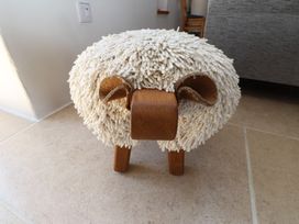 A stool designed to resemble a sheep at Wern Olau Cottage Groeslon near Caernarfon