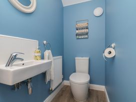 A bathroom with a sink and toilet at Coastal Cottage The Bay near Filey