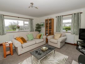 A living room with a sofa and armchairs at Blaenywawr near Lampeter