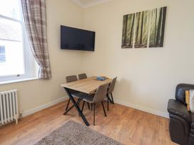 A dining room with a table and chairs at St Johns View in Keswick