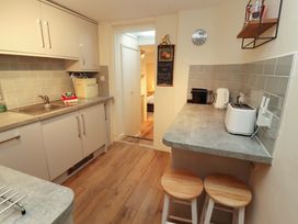 A kitchen with a sink and appliances at Archers in Keswick