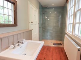 A bathroom with a sink and shower at Little Ellers in Portinscale near Keswick