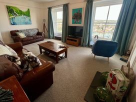A living room with a coffee table and sofa at Westcliff in Newlyn
