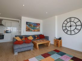 A living room with a sofa and coffee table at The View in Newquay
