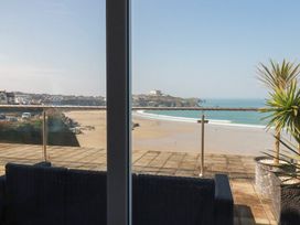An outdoor terrace with a view of the beach and ocean at The View in Newquay