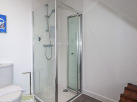 A bathroom with a shower and toilet at The View in Newquay