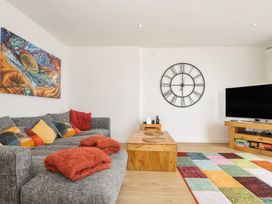 A living room with a sofa and a coffee table at The View in Newquay