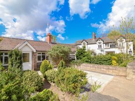 A house with garden and pathway at Riverlea in Dyserth